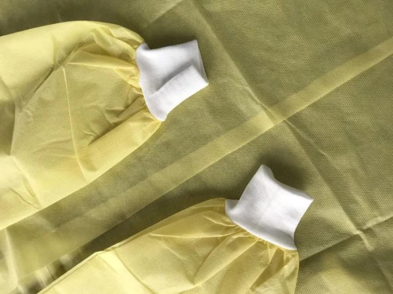 Yellow PP PE Coated Isolation Gown with Thumb Loops