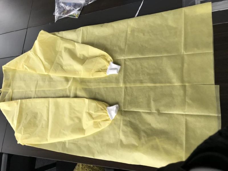 Yellow PP PE Coated Isolation Gown with Thumb Loops