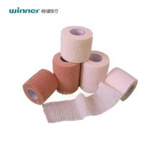 Winner Medical Cotton Cohesive Flexible Bandage Adhesive Plaster Tape Cohesive Good Dressing Adhesive Tape Made in China